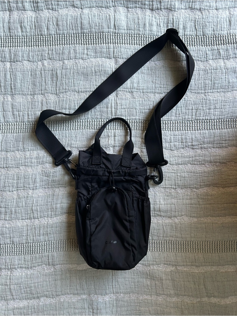 CALPAK water bottle bag